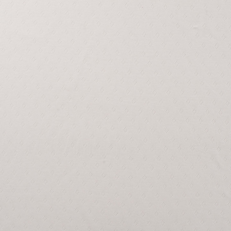 Trikå med hålmönster vit