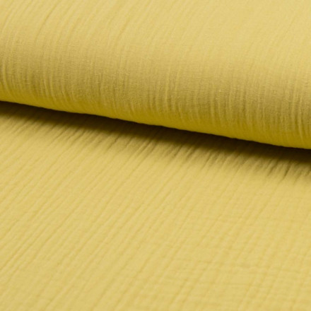 Muslintyg soft yellow